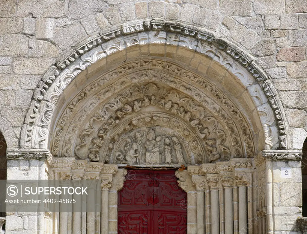 Gothic art. Church of St. Mary of Azogue. Late 14th century and early 15th century. Front with decorated archivolts and tympanum depicting the Adoration of the Magi and the Annunciation. Betanzos. Galicia. Spain.