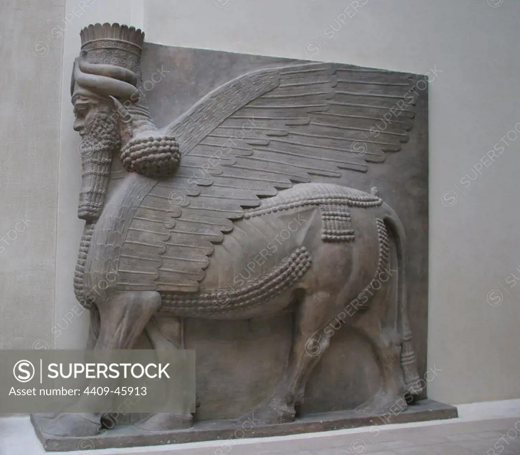 Assyrian Art. "Lamasu" or Bull-man. Reliefs from Sargon II's Palace. Dur-Sharrukin (Khorsabad). Assyria, 721-705 BC. Alabaster. 8th century BC. Louvre Museum. Paris. France.
