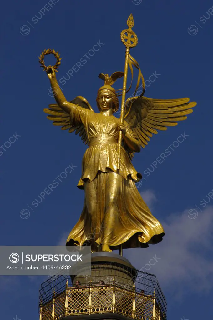 Germany. Berlin. Bronze sculpture of Victoria, designed by the German sculptor Friedrich Drake (1805-1882), on the top of the Victory Column, wich was designed to commemorate the Prussian victories in the Danish-Prussian War, Austro-Prussian War and in the Franco-Prussian War. Tiergarten Park.