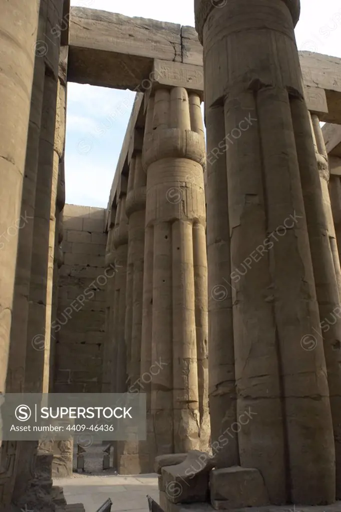 Temple of Luxor. Four rows of eight columns fasciculate with closed papyrus capitals of hypostyle. Detail. New Kingdom. Egypt.