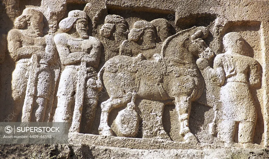 Sassanian rock relief, ca, 350 AD. Relief VI. The victory of King Shapur II (r. 309-379). Detail. Soldiers next to a horse. Bishapur, Fars Province, Iran. (Old Persia).