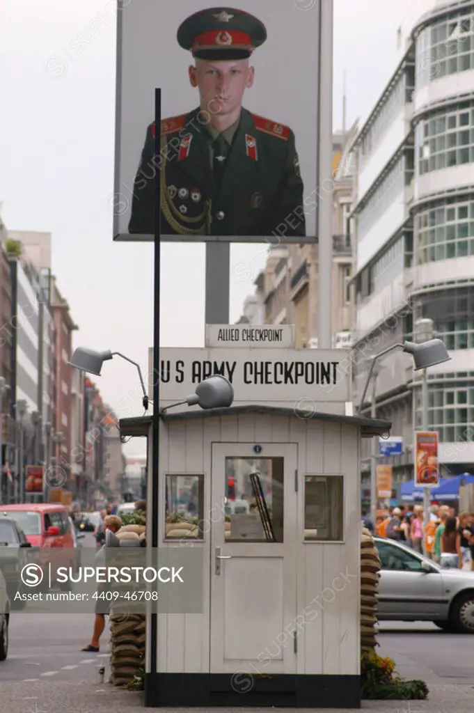 Checkpoint Charlie. The most famous of the crossing points of the Berlin Wall between the two parts of the city. Photography of a soldier and the reconstruction of the gatehouse. Berlin. Germany.