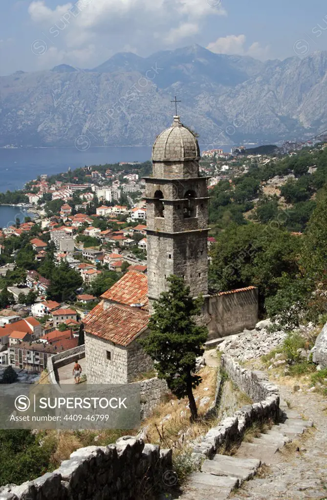 REPUBLIC OF MONTENEGRO. KOTOR. Partial view of the city along the fjord and the church of Our Lady of Remedy (1518). In 1979 UNESCO declared World Heritage the whole Natural, Cultural and Historical region of Kotor.