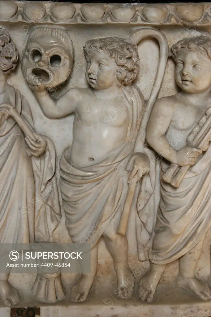 Roman Art. Relief of sarcophagus. Child with theatrical mask. Vatican Museum. City of the Vatican.
