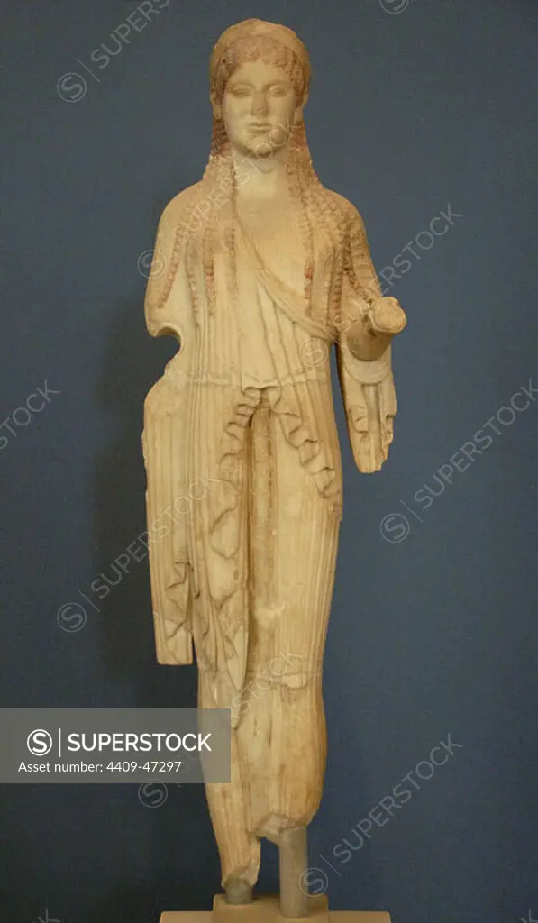 GREEK ART. VI-V B.C.GREECE. KORE. Marble statue. Dated between 500-490 b.C. Acropolis Museum. Athens. Greece.
