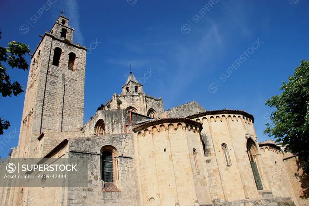 Art romanesque. The Royal Benedictine Monastery of Sant Cugat. Built betwenn the 9th and 14th centuries. View of the bell tower and the apsis. Sant Cugat del Valles. Catalonia. Spain.