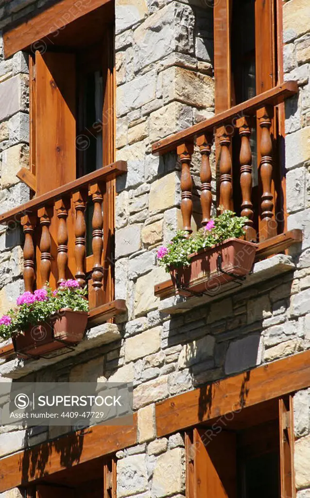 Spain. Aragon. Benasque. Pyrenees. Traditional architecture. Facade with balcony. Detail.