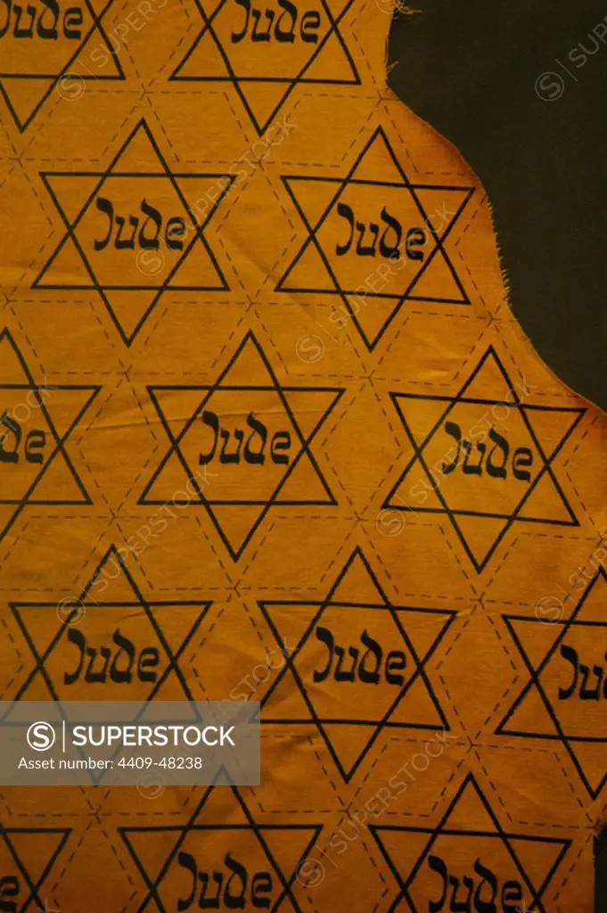 Stars of David with the word "Jude" used to mark the Jews. Jewish Museum Berlin. Germany.