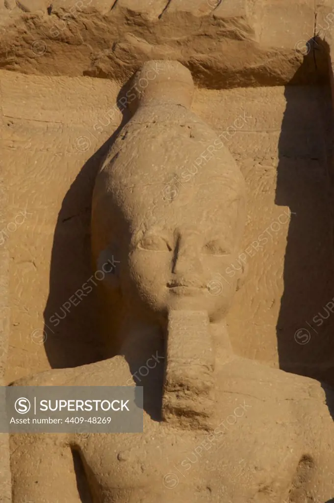 Egyptian art. Temple of Hathor or Small Temple dedicated to Nefertari. Facade depicting the pharaoh Ramses II (1290-1224 BC) with white crown of Upper Egypt and false beard. 19th dynasty. New Kingdom. Abu Simbel. Egypt.