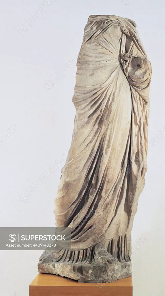 Spain. Roman female sculpture with tunic. Marble. Archaeological Museum of Catalonia. Barcelona.