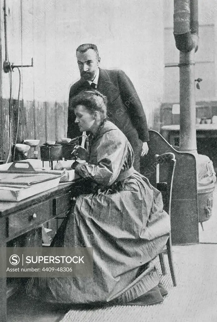 CURIE, Pierre (Paris, 1859-1906); Marie (Warsaw, 1867-Sallanches, 1934). French physicists. Discoverers of the radium in 1898. They received the Nobel Prize in Chemistry in 1903. Portrait of Pierre and Marie in the laboratory. YEAR 1904.
