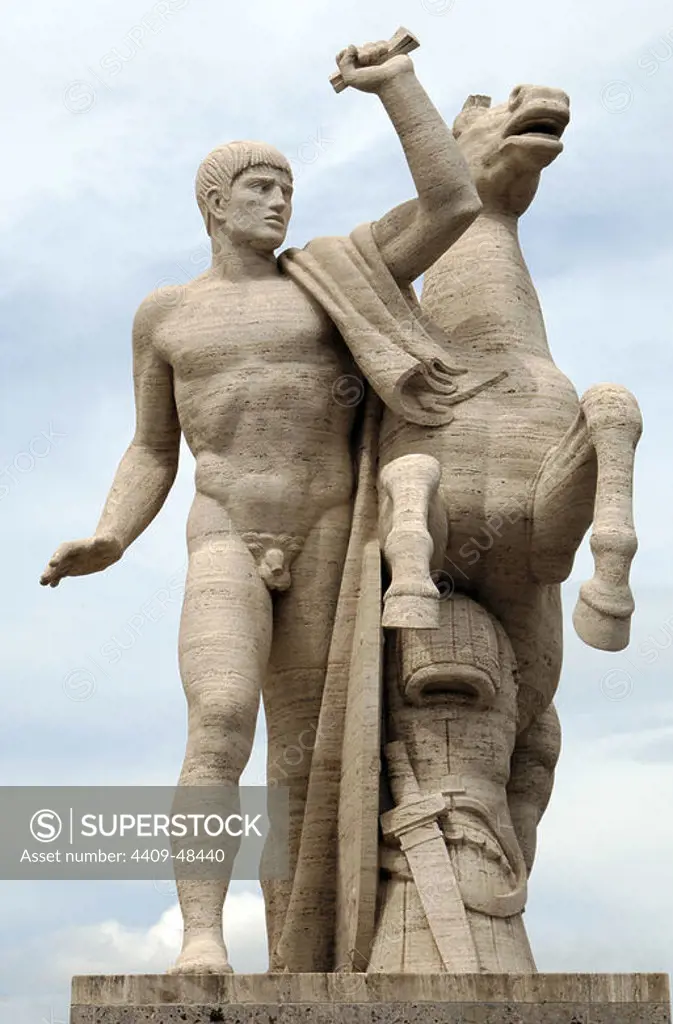 Italy. Rome. Sculpture of one of the Dioscuri (Castor and Pollux) in front of the Palace of the Italian Civilization. By Publio Morbiducci (1889-1963) and Alberto Felci.