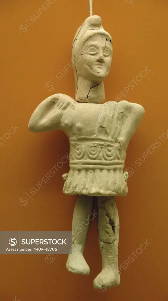 Clay puppet depicting a Roman soldier used as a toy. Dated between I and III centuries a.C. Mirak Fragonisi Cemetery. Olympia Archaeological Museum. Ilia Province. Peloponnese region. Greece.