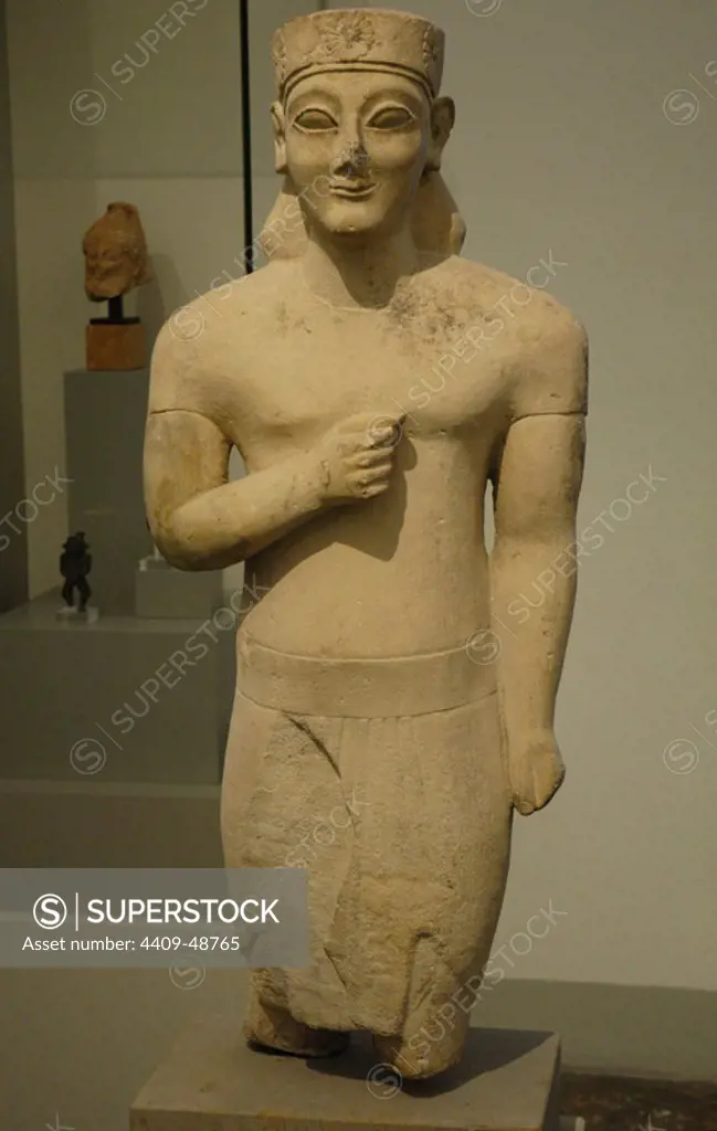 Greek Art. Cyprus. Kouros. Statue of a young man dated to 550 BC. Limestone. It comes from Dali (Cyprus). Egyptian Museum (Altes Museum). Berlin. Germany.