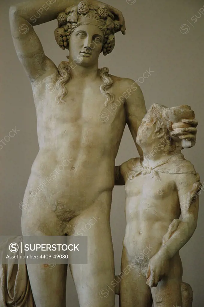 Statue of Dionysus with a satyr. Marble. 2nd century AD. From the Baths of Faustina at Miletus. Pergamon Museum. Berlin. Germany.