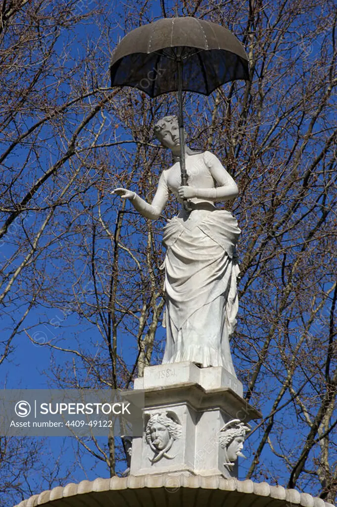 Joan Roig Soler (1852-1909). Spanish sculptor. The lady of the umbrella, (1884). Citadel Park. Barcelona. Catalonia. Spain.
