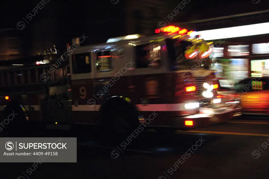 Fire brigade going to an emergency at night. Washington D.C. United States.