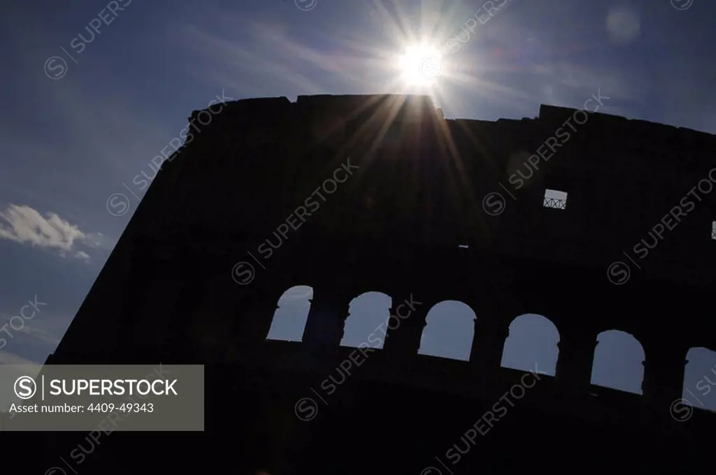 Italy. Rome. The Colosseum or Flavian Amphitheatre. Its construction started between 70 and 72 AD under emperor Vespasian. Was completed in 80 AD under emperor Titus. Exterior. Backlighting.