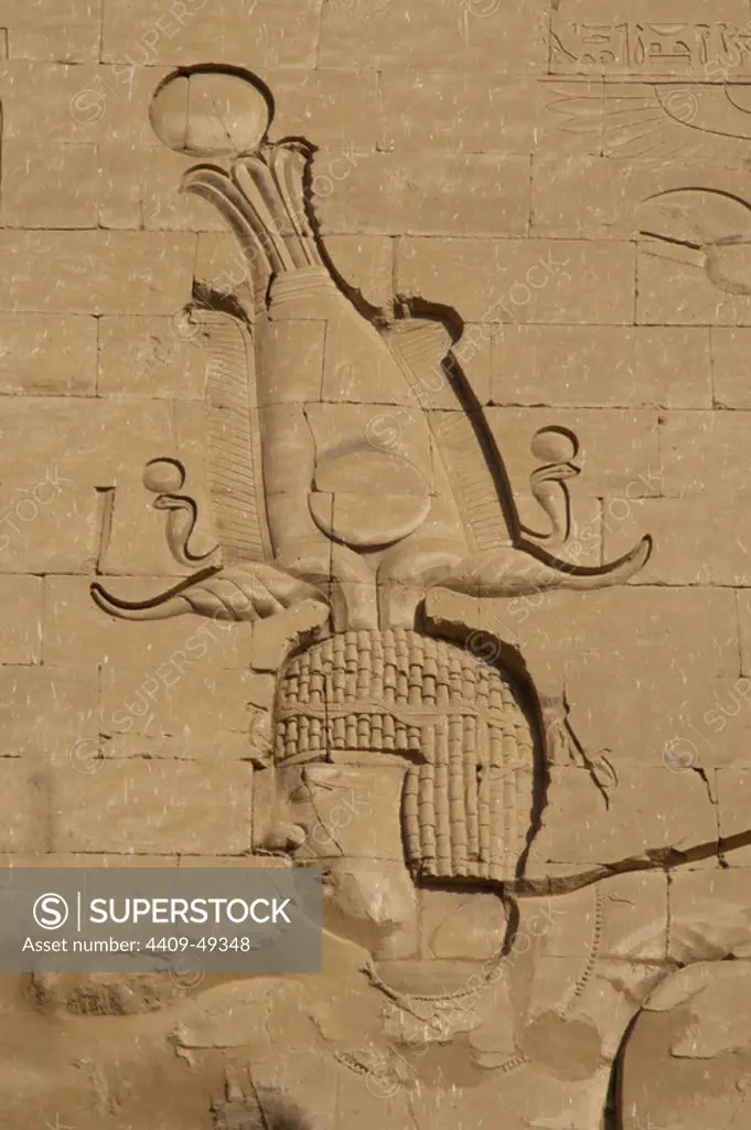 Temple of Horus. The pharaoh Ptolemy XII Neo Dionysos. Main entrance. First pylon. Detail. Edfu. Egypt.