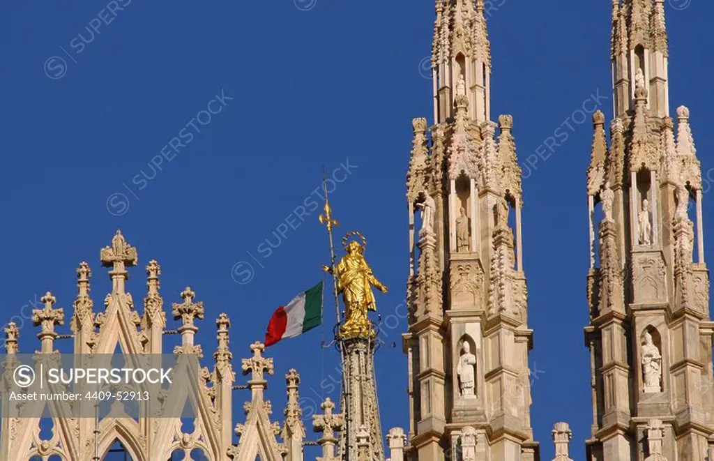 Italy. Milano. Madona del Duomo. Golden sculpture of the Virgin, by Giuseppe Perego in 1774. Cathedral.