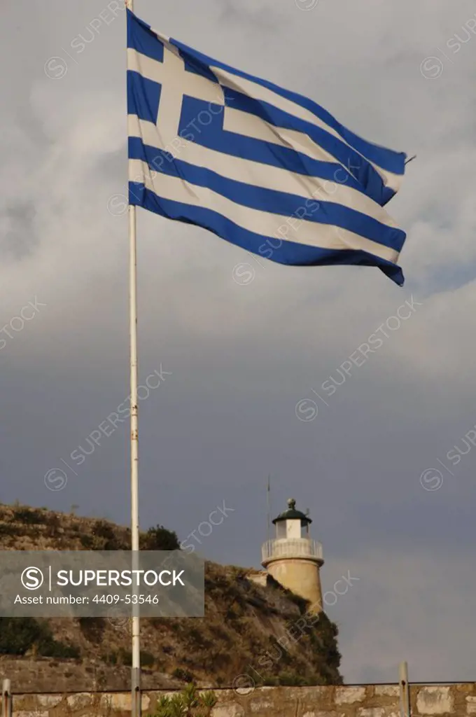 Greece flag waving at the Old Venetian Fortress. Corfu. Ionian Islands. Greece.