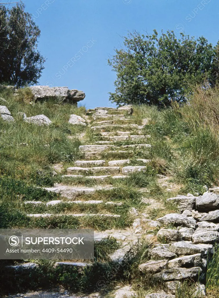 Turkey. Troy. City of Asia Minor. Troy VI stratum (1900-1300 BC). Bronze Age. Ruins of access stairway to the acropolis.
