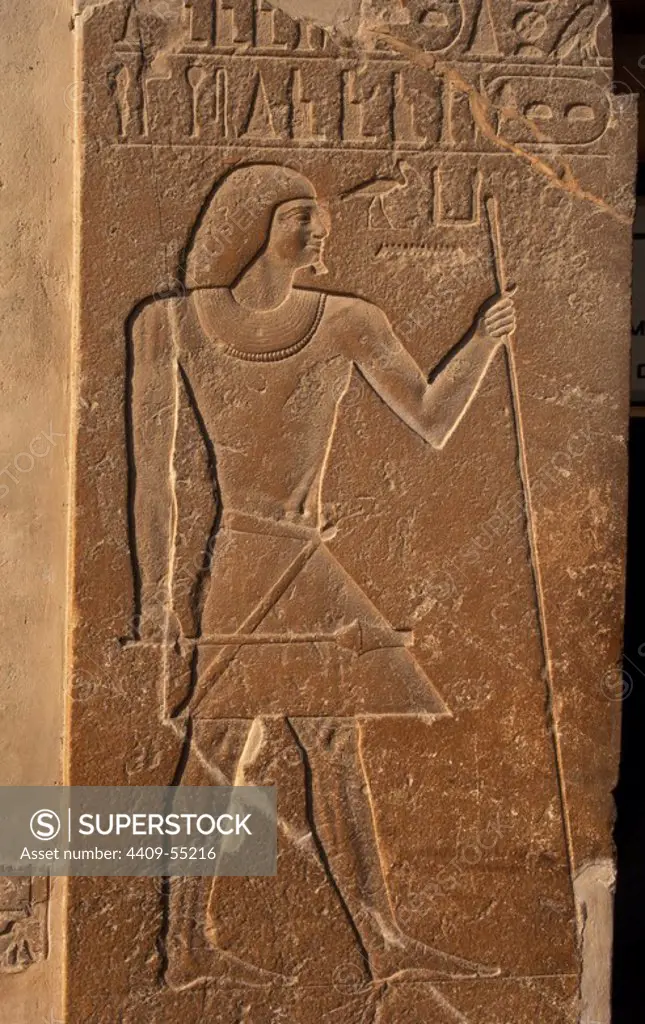 Mastaba of Kagemni (2350 BC). Chief Justice and vizier of the Pharaoh Teti. Relief at the entrance depicting Kagemni with the baton and scepter. Old Kingdom. Saqqara. Egypt.