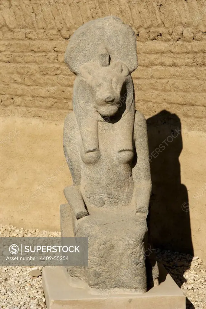 Statue of Goddess Sekhmet depicted with head of lioness and solar disk. Precinct of Mut. Karnak Temple Complex. Luxor. Egypt.