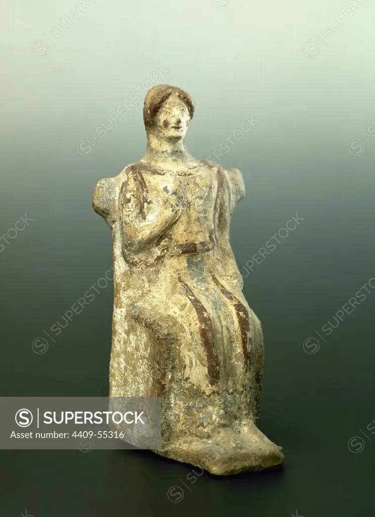 Iberian era. Female sculpture in terracotta depicting a goddess of fertility. National Archaeological Museum. Madrid, Spain.