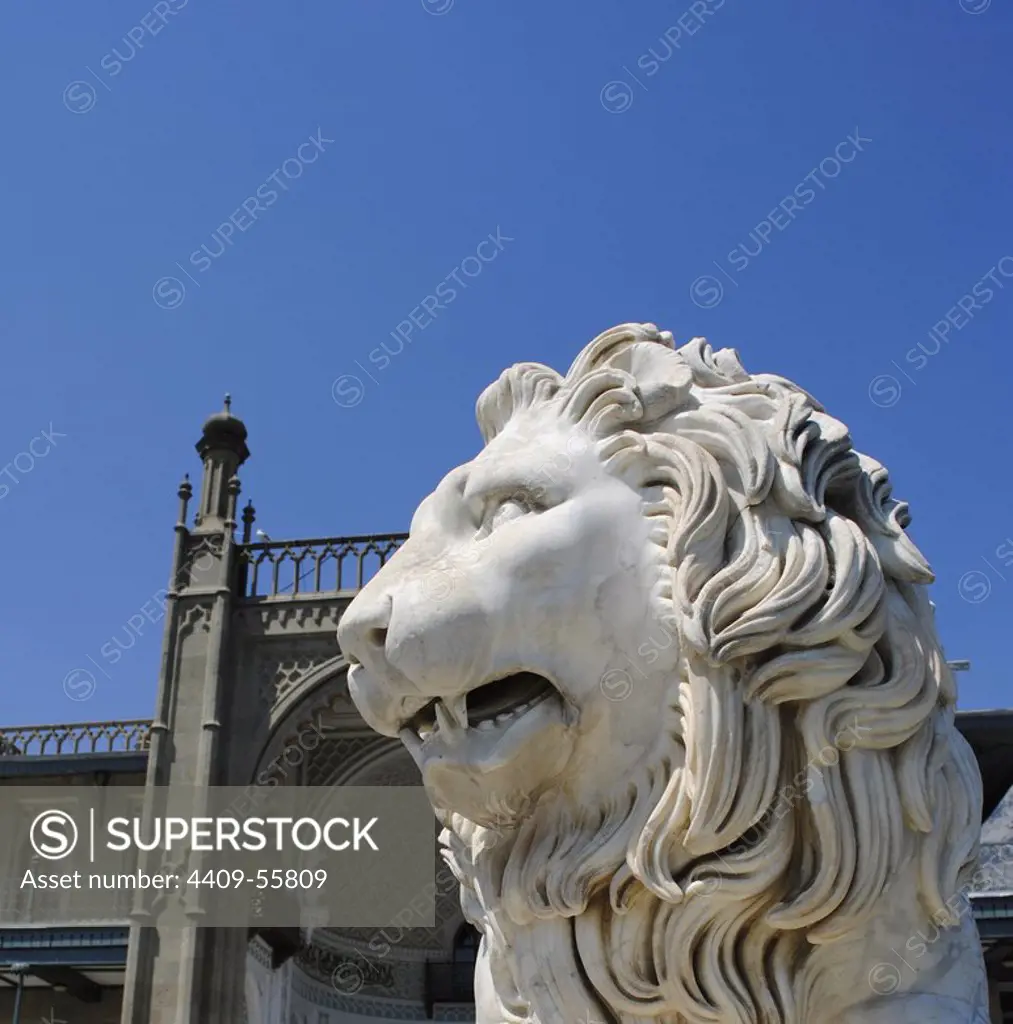 Ukraine. Autonomous Republic of Crimea. Vorontsov Palace. Built in 1828 through 1848 by the English architect Edward Blore (1787-1879) as a summer residence of Prince Mikhail Semyonovich Vorontsov. Southern facade with a white marble Medici lion sculpture by Italian sculptor Giovanni Bonnani. Alupka.