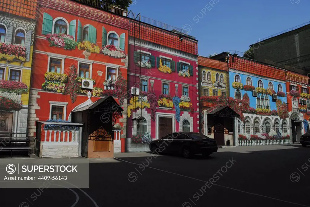 Ukraine. Kiev. Buildings facade decorated with paintings.