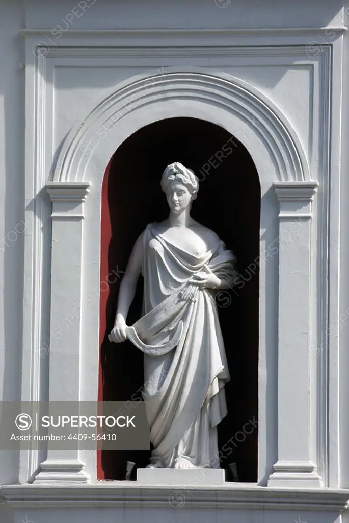 Ukraine. Odessa. Sculpture of Ceres, goddess of agriculture, carrying the attributes of the sickle and the spike. Facade of the town hall of the city.