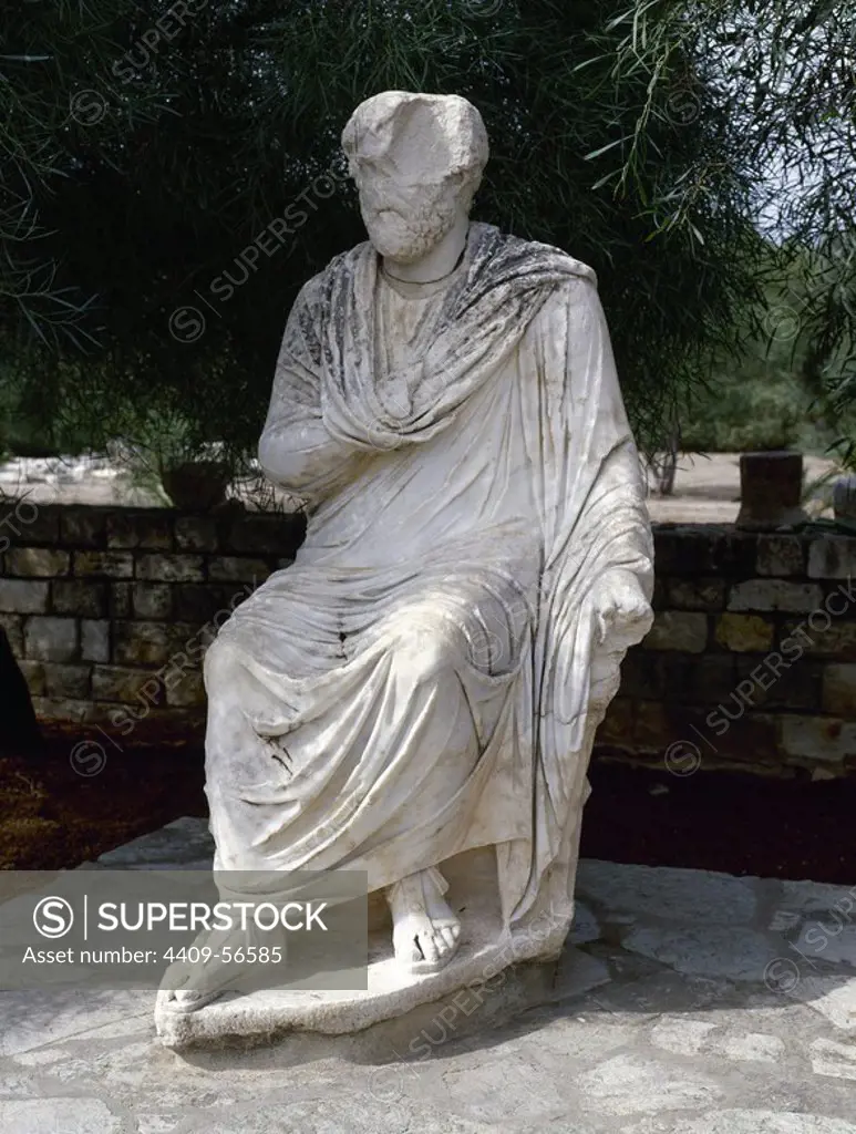 Marble statue of a robed Roman. Lapidarium. Archaeological site of Gortyn. Island of Crete. Greece.