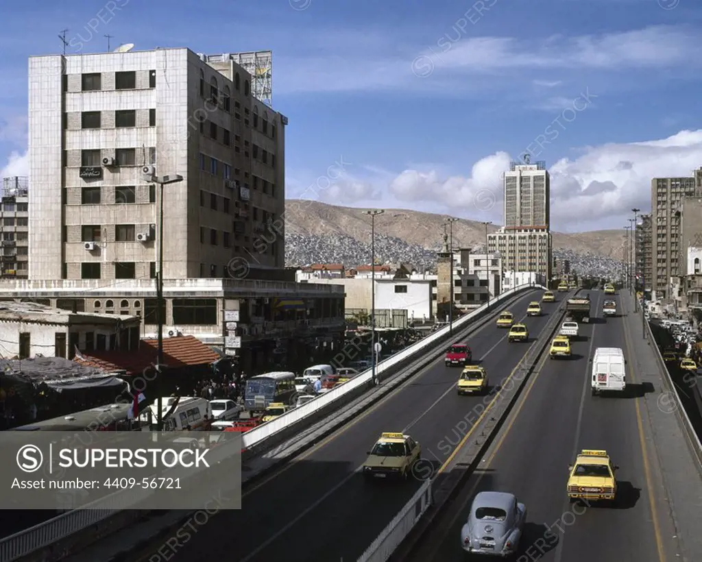 Syrian Arab Republic, Damascus. Avenue on the outskirts of the city. Photo taken before the Syrian civil war.