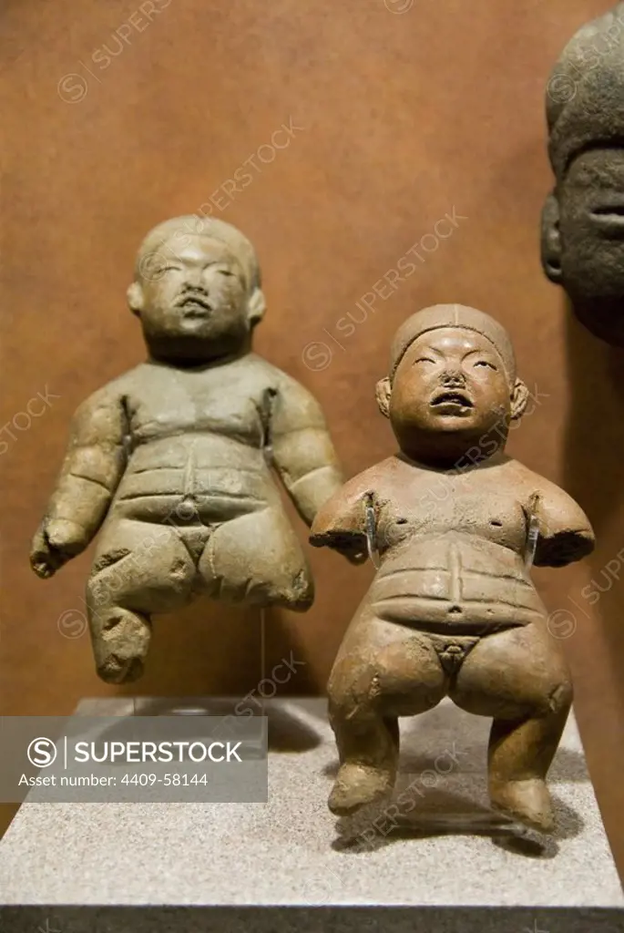 Mexico.Mexico city.National Museum of Antropology.Olmec culture.Terracotta figurines representing girls..