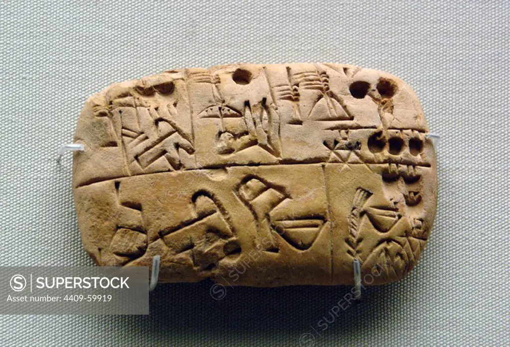 Early writing. Pictographs drawn. Mesopotamia. Record of food supplies. From Iraq. Late Prehistoric period. About 3000BC. Early administrative text. Cuneiform tablet. British Museum. London. England. United Kingdom.