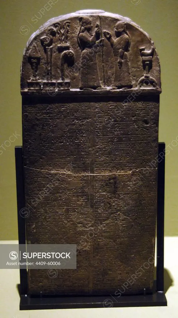 Kudurru (stele) of King Marduk-zakir-shumi (852-828 BC). An act of donation to a priest of the temple of Eana of Uruk. Mesopotamia. Limestone. Cuneiforme. Babylon exposore. Louvre. Paris.
