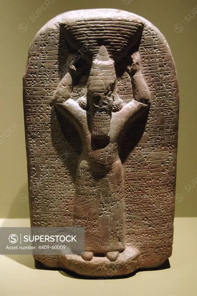 Mesopotamia. Stela of Ashurbanipal. The inscription records that he restored the Esagil temple of Marduk, Babylon. 665-653BC. Cuneiform script. Babylon exposore. Louvre. Paris. France.