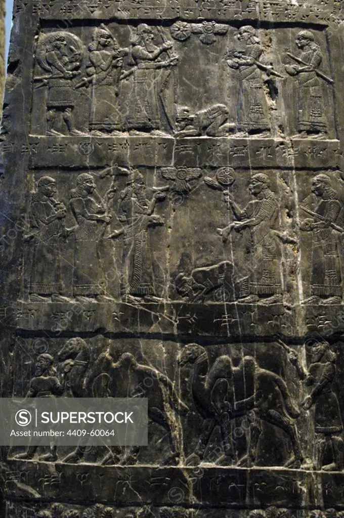 Assyrian culture. The Black Obelisk of Shalmaneser III. Black limestone. Bas-relief depicting military campaigns and receiving tribute, 858-824 BC. The Shalmaneser receives tribute from Iaua (Jesu) of the House of Omri (ancient northern Israel). From Nimrud, Iraq. British Museum. London, England, United Kingdom.
