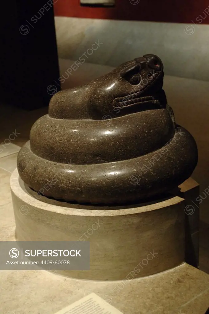 Pre-colombian. Aztec coiled rattlesnake, c. 1325-1521. Granite. Height : 36 cms., diameter: 53 cms. British Museum, London, England, United Kingdom.