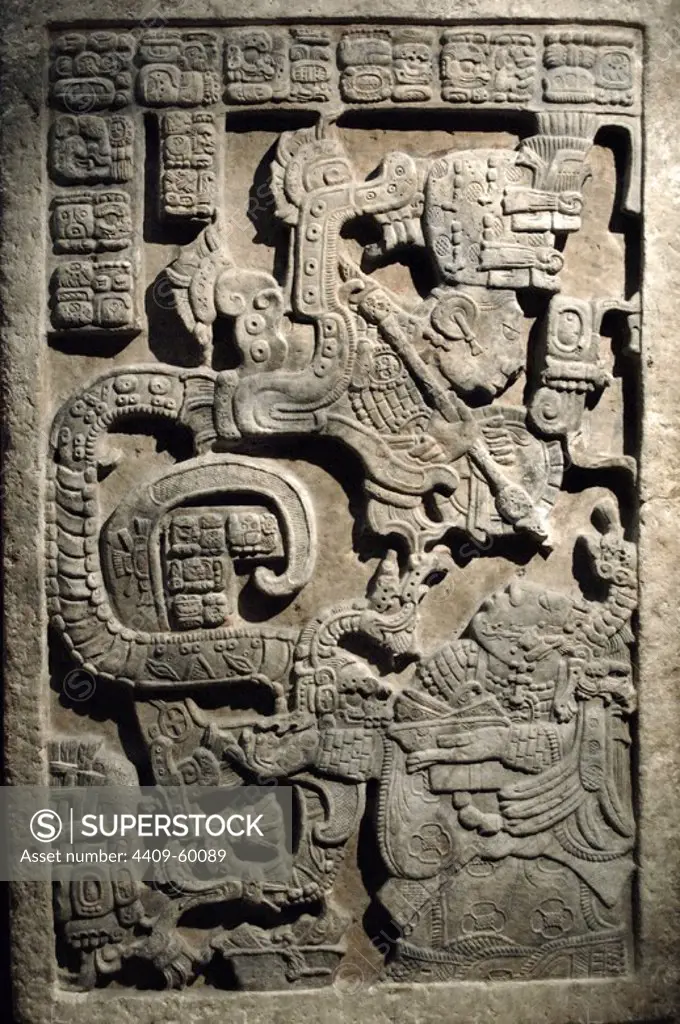 Lintel 25. Lady K'ab'al Xook. Lady Xook is in the hallucinatory stage of the bloodletting ritual. She conjures before her a vision of a Teotihuacan serpent. This lintel is one of a series of three panels from Structure 23 at Yaxchilan. Limestone, 725-760. Late Classic Maya. Yaxchilan, Chiapas state, Mexico. British Museum. London, England, United Kingdom.