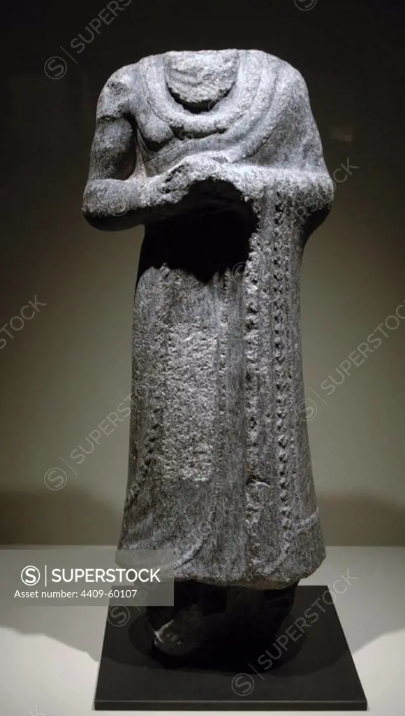 First Babylonian dynasty. Headless statue. Praying attitude. Diorite. 20th-19th century BC. From Susa , Iran. Mesopotamia. Louvre Museum. Paris, France.