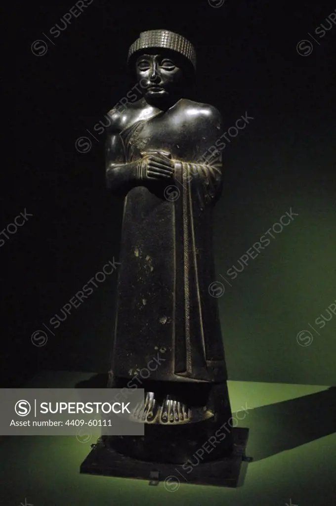Statue of Gudea, Prince of Lagash State. Girsu (present day Tello, Iraq). Mesopotamia. Diorite, c. 2120 BC. Second dynasty of Lagash. Louvre Museum. Paris, France.