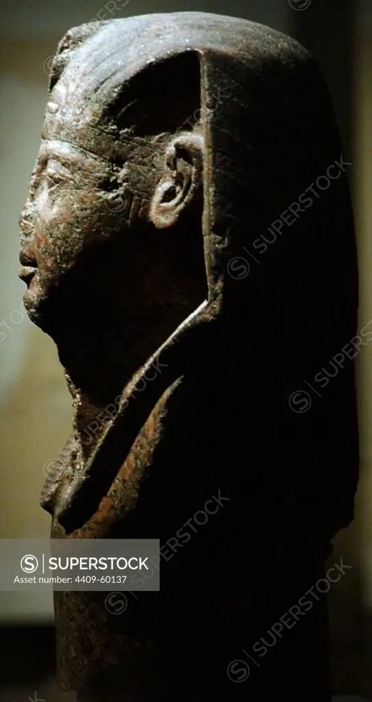 Head of Pharaoh, probably Ramesses II. Red granite. 19th Dynasty. New Kingdom. 1250 B.C. British Museum. London. England. United Kingdom.