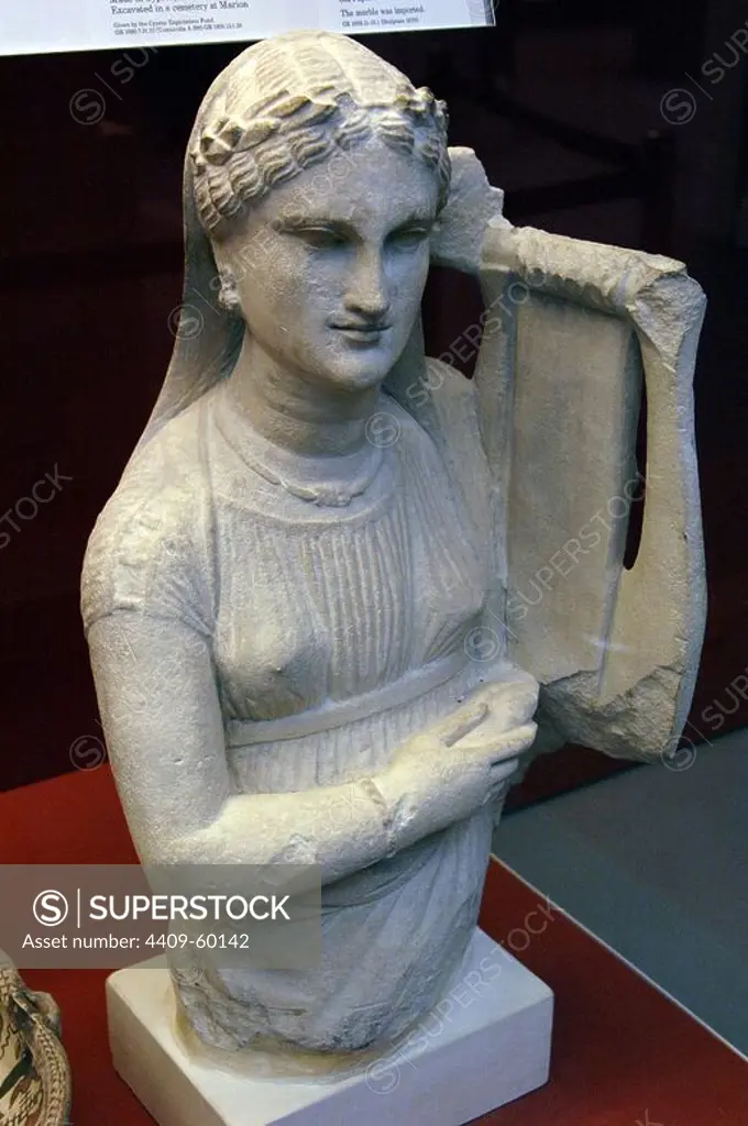 Statue of a female worshipper playing a lyre. Limestone. Made in Cyprus. 300-280 BC. From Larnaka. British Museum. London. England. United Kingdom.
