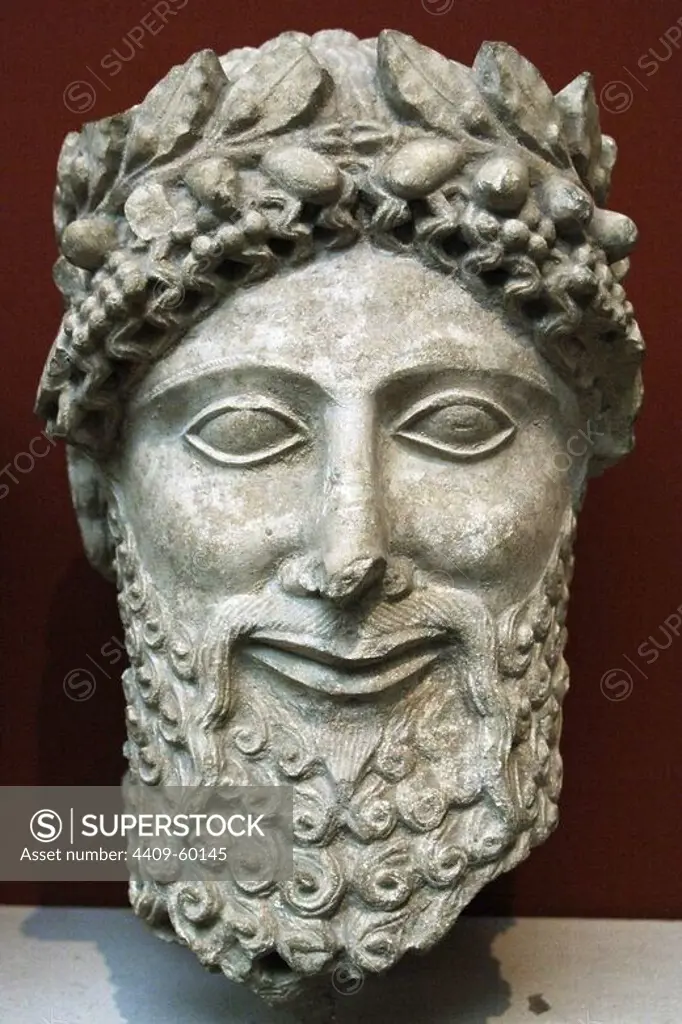 Head from a statue of a bearded man with laurel wreath. Probably an priest. Limestone. Sculpted in Cyprus between 475-450 BC. From the Sanctuary of Apollo at Idalion. British Museum. London. England. United Kingdom.