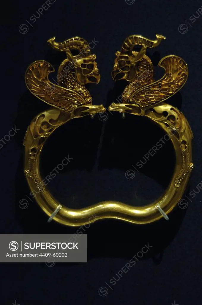 Oxus Treasure. Gold armlet with ends in the form of winged monsters with griffin head low relief. 5th-4th centuries BC. From Takht-i Kuwad, Tajikistan. British Museum. London. England. United Kingdom.