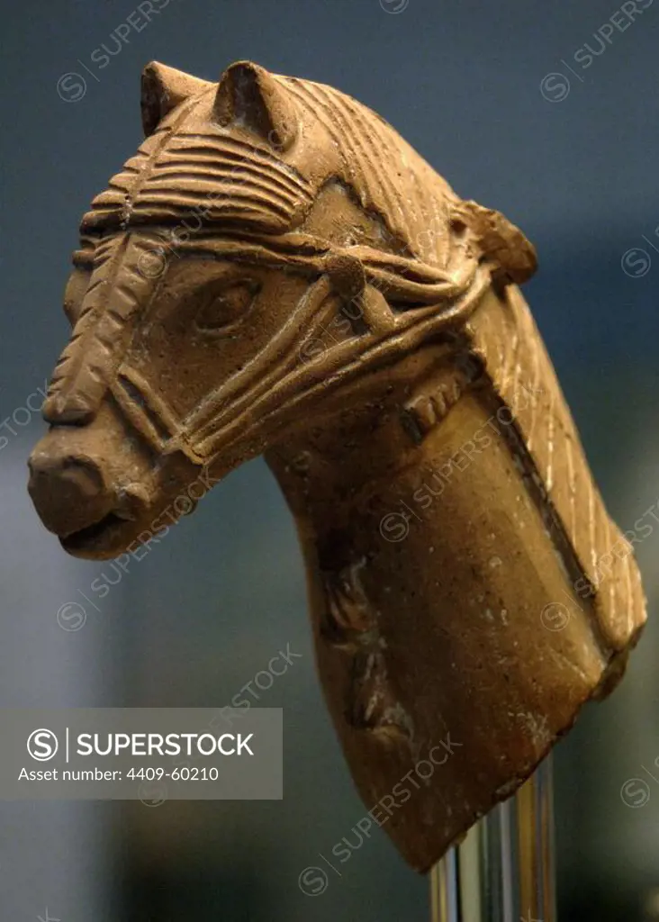 Head of a horse wearing a harness, part of a larger figure of a horse and rider. Terracotta. 600-500 BC. Made in Cyprus. From the Sanctuary of Apollo, Phrangissa. British Museum. London. England, United Kingdom.