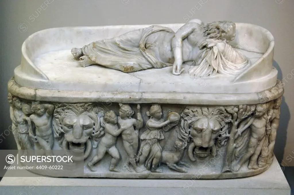 Sarcophagus of a child decorated with reliefs depicting the procession of Bacchus, god of wine, and his followers. Marble. 220-250 AD. The lid, with the reclining figure of Silenus, is modern. From Rome. British Museum. London. England. United Kingdom.