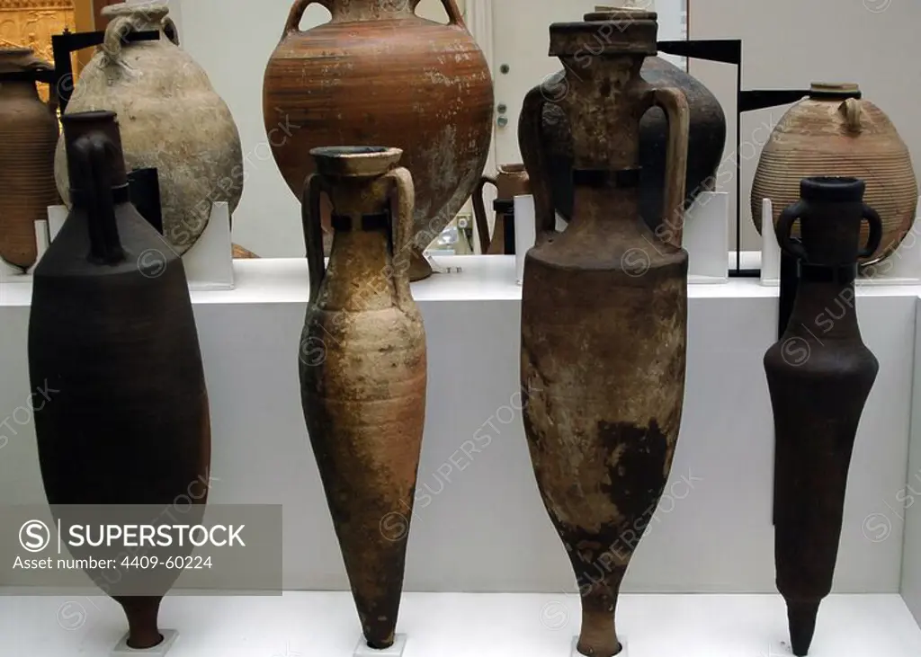 Different types of amphorae. From left to right: wine amphora, 1st century AD, from Rome; amphora for fish, 1st century AD, from Spain; wine amphora, 2nd-1st centuries BC, from Baths of Titus at Rome, probably for wine amphora, 2nd -3rd centuries AD, from Egypt. British Museum. London. England. United Kingdom.